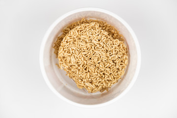 Instant noodle on white isolated background, copy space