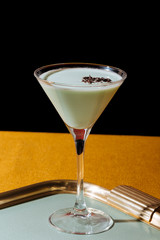 Grasshopper cocktail, an old classic from New Orleans, with green creme de menthe. white creme de cacao and light cream (or single cream in UK) 