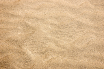 Fototapeta na wymiar Sandy beach for background. Sand on the beach