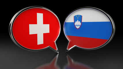 Fototapeta premium Switzerland and Slovenia flags with Speech Bubbles. 3D illustration