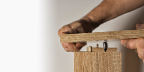 Installation using a threaded furniture fastener tool
