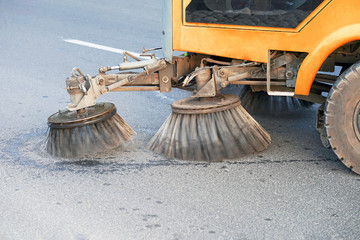 Street sweeper machine working. Street cleaning machine.