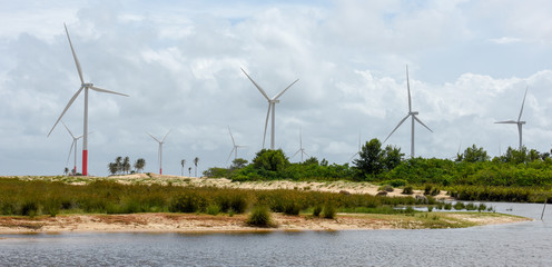 Windmills on the sand dunes of Lencois Maranhenses near Atins, Brazil