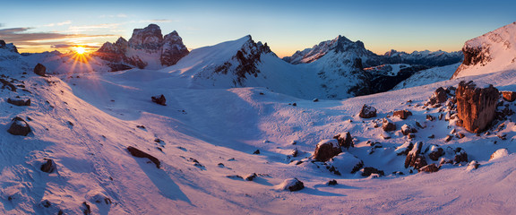Fantastic sunrise in the Dolomites mountains, South Tyrol, Italy in winter. Italian alpine panorama with steep rocky walls, Monte Pelmo in dramatic light. Christmas or Happ new Year time.
