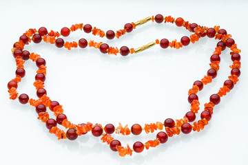 Necklaces, beads, handmade bracelets are made of artificial stone of different breeds.