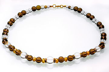 Necklaces, beads, handmade bracelets are made of artificial stone of different breeds.