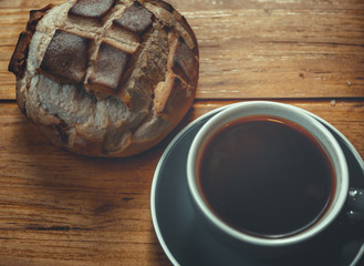 Coffee. Glass coffee cup on wooden background. vintage style