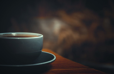 Coffee. Glass coffee cup on wooden background. vintage style