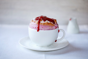 Raspberry souffle with sauce