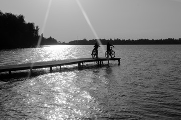 children on the lake