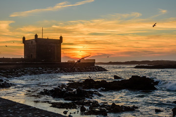 Sightseeing of Morocco. Beautiful sunset in Essaouira port.