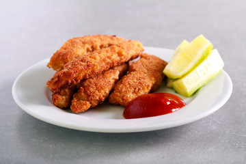 Chicken nuggets with ketchup