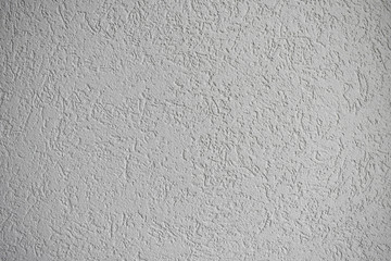 Grey house acrylic plaster facade closeup