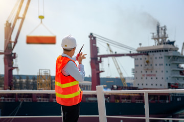 stevedore, loading master, port captain or supervisor in charge of command working on board the...