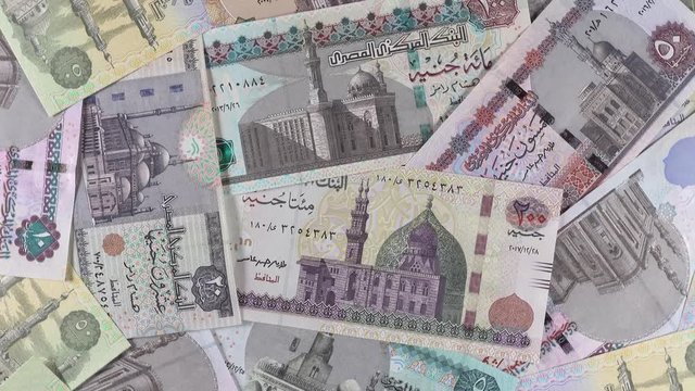 Egyptian pound notes slow rotating. Egypt money currency. 4K stock video footage