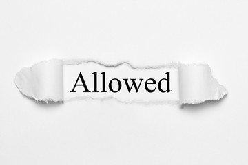 Allowed on white torn paper