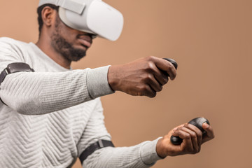 Man in VR glasses now is playing 3D game but Mankind stands on the threshold of a new era of...