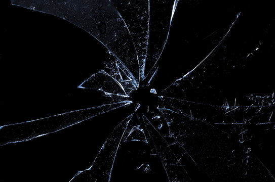 Broken glass texture and background, isolated on black, cracked window effect, clipping path  