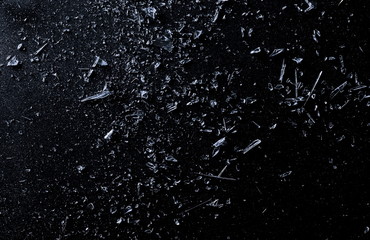 Explosion glass, dust and piece texture and background, isolated on black, cracked window effect 