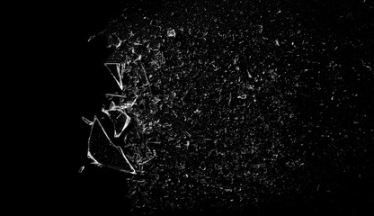 Explosion glass, dust and piece texture and background, isolated on black, cracked window effect 