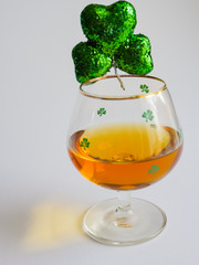 St Patricks Day Irish Whiskey Glass with Shamrock Close Up