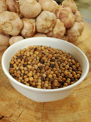Garlic, pepper and dry chili main ingredient of cooking Thai food preparation by blending and mixing in stone mortar and mix in meat, pork or chicken for cooking Thai curry, have space for write wordi