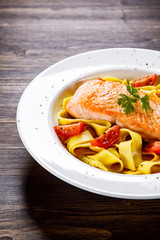 Pasta with grilled salmon and vegetables