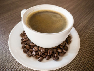 cup of coffee with beans