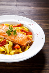 Pasta with grilled salmon and vegetables