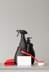 Red and black set of tools and tools for cleaning the kitchen. Neutral background.Copy space.