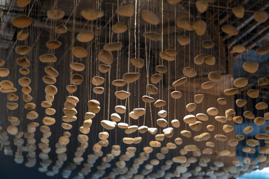 Unusual ceiling made of stones. Stones hang from the ceiling. Time to collect stones.
