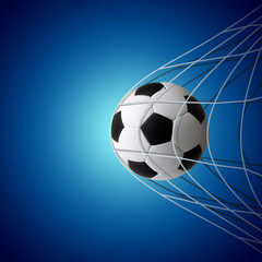 Naklejka premium Soccer ball in goal on blue