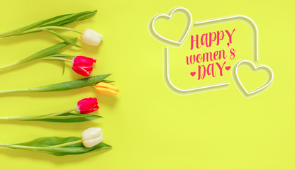 Happy Women's Day. Spring tulips on background. International Women's day.