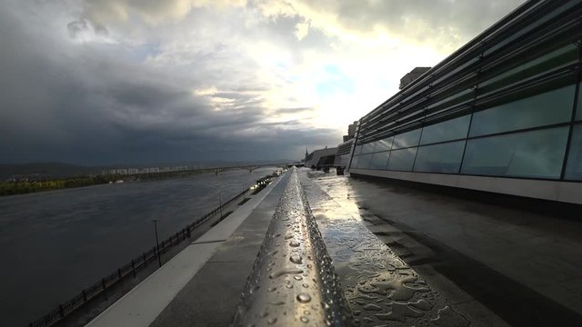 Quay after the rain, city, big river, bridge, metal, glass, clouds, rays 2