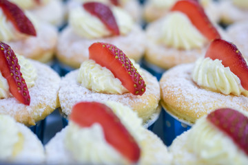 Vanilla cheese cupcake topping with strawberry