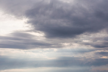 Fototapeta premium White clouds and blue sky from an airplane