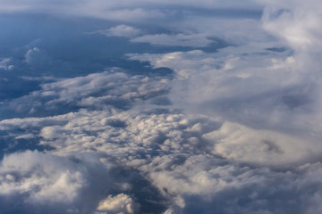 White clouds and blue sky from an airplane