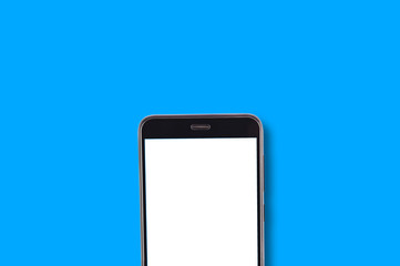 Single black smartphone with isolated blank white screen on blue background with copy space for your text. Top view