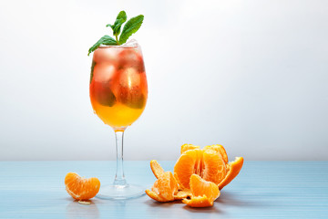 Fresh tangerine juice with ice.
