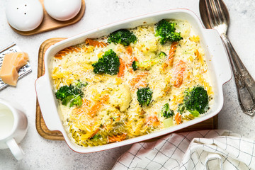 Casserole from pasta and vegetables in baking dish.