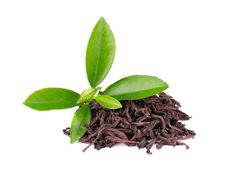 Black Ceylon tea with soursop, isolated on white background.