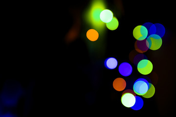 Bokeh.  Holiday background. Garland. Christmas lights. Defocused sparkles
