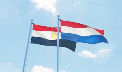 Fototapeta na wymiar Netherlands and Egypt, two flags waving against blue sky. 3d image