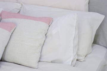 Fototapeta na wymiar Decorative pillow natural Fabric on the bed
