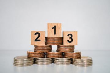 Winner podium on pile of coins using as stock exchange, business competition and financial concept