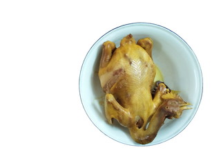 Boiled chicken in white dish isolate on white background.