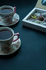 Candy handmade. Sweets without sugar from dried fruits and nuts. Proper nutrition. Delicious gift for a woman. Side view.