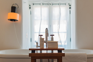 Modern beautiful bathroom interior. Tap and bathtub 