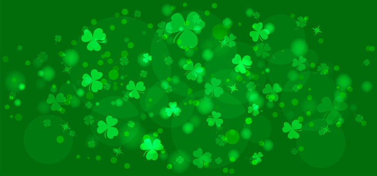 St. Patricks day background with shamrock. Shining clover shamrock leaves on green background. Template for poster, gift certificate, greeting cards design, banner