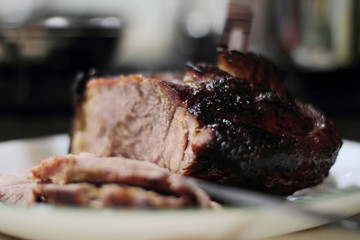 Sliced pork butt on a plate.